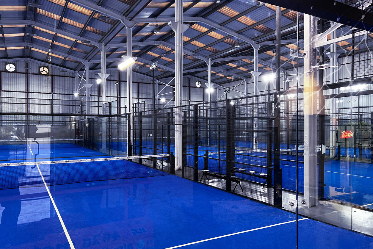 Paddle tennis couple in court ready for play and train