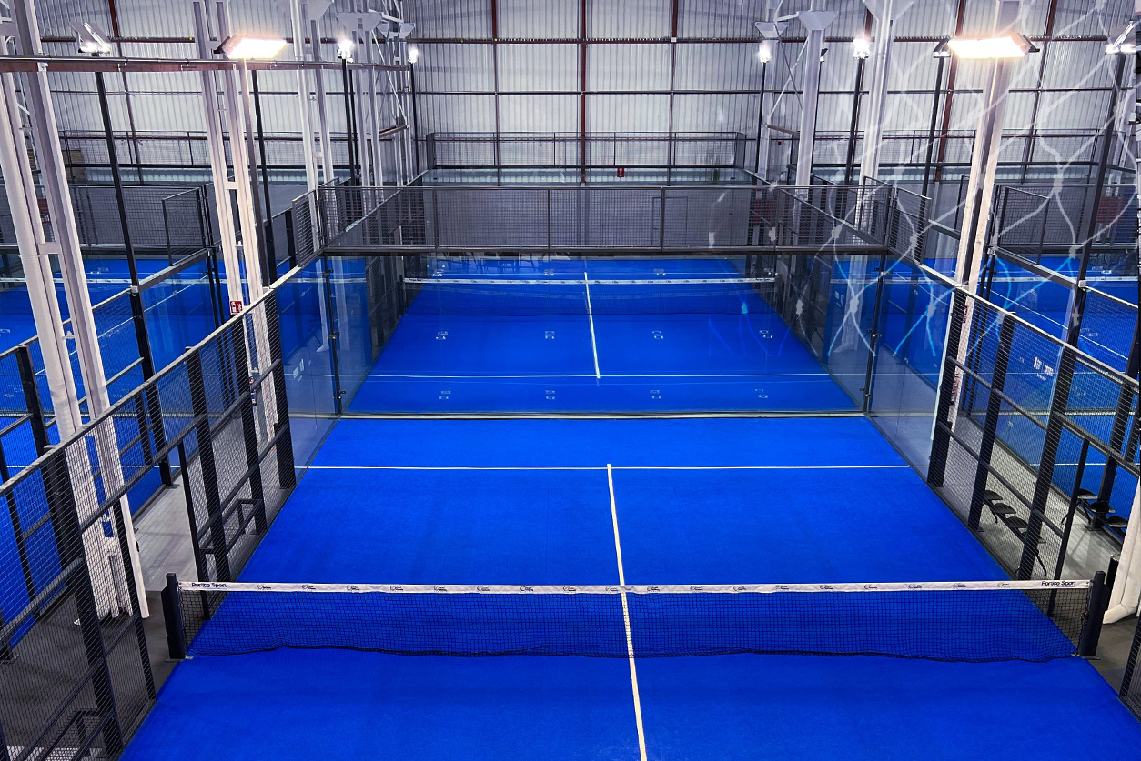 Paddle tennis couple in court ready for play and train